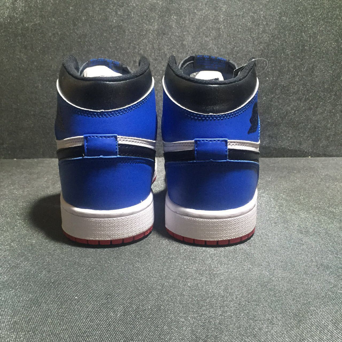 Jordan 1 High Three-Color Sneaker in Black, Blue and Red