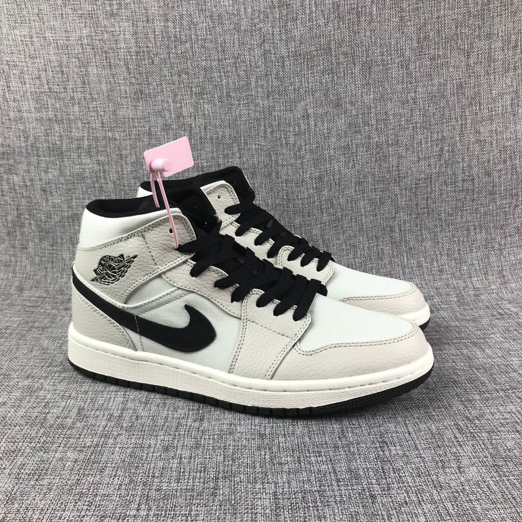 Air Jordan 1 Mid Grey and Black High-Top Sneakers