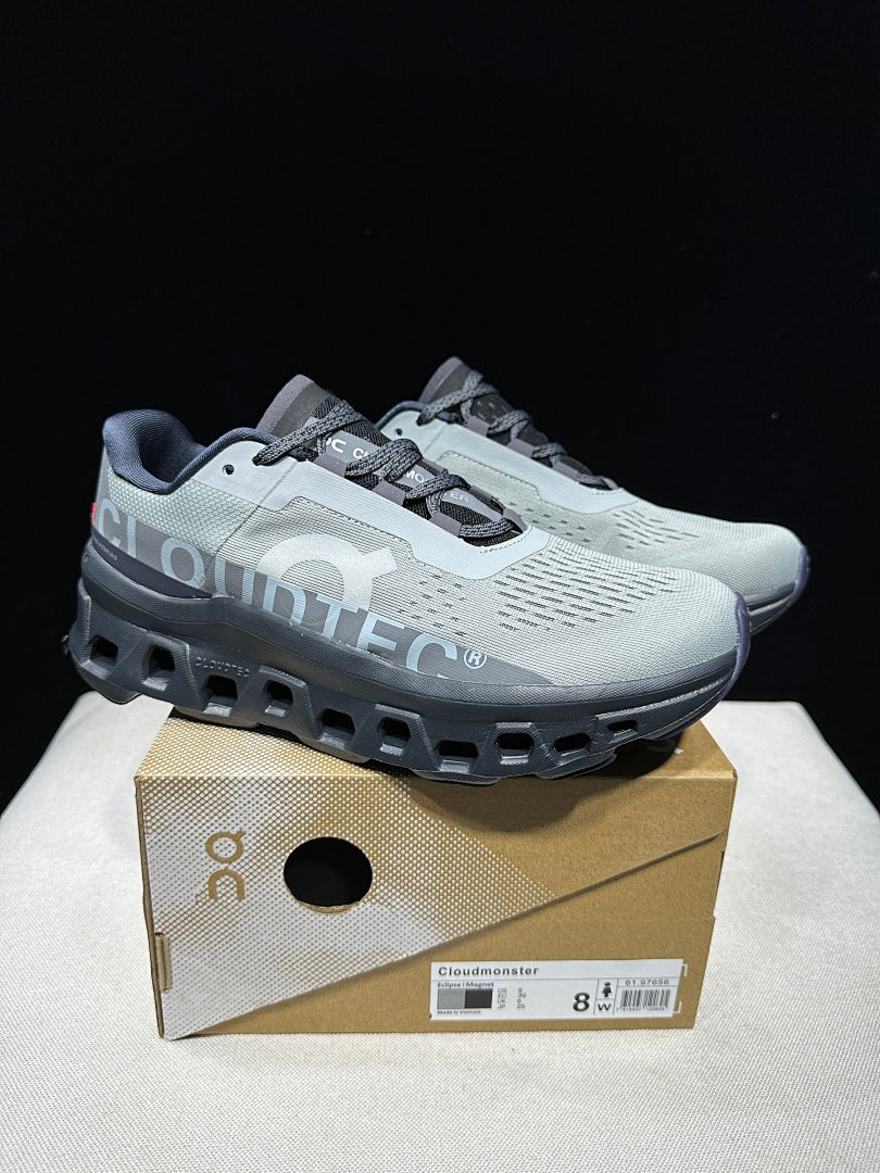 On Cloudmonster Running Shoes in Eclipse and Magnet
