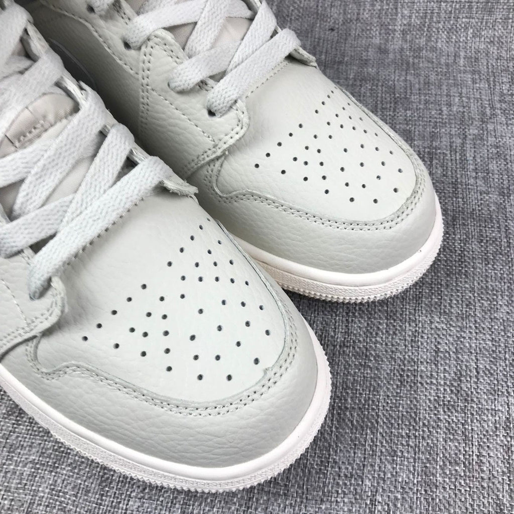 Air Jordan 1 Mid Sneakers in White and Grey