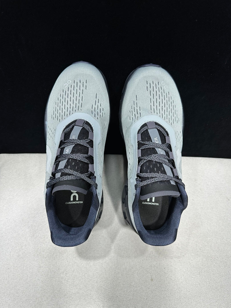 On Cloudmonster Running Shoes in Eclipse and Magnet