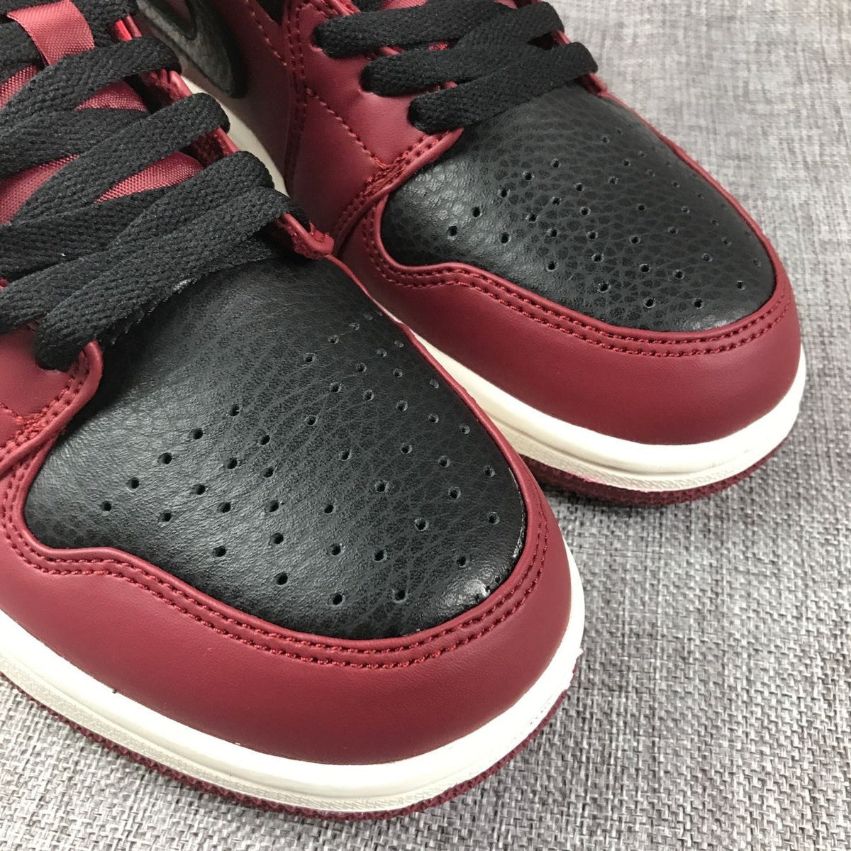 Air Jordan 1 Mid Burgundy and Black High-Top Sneakers