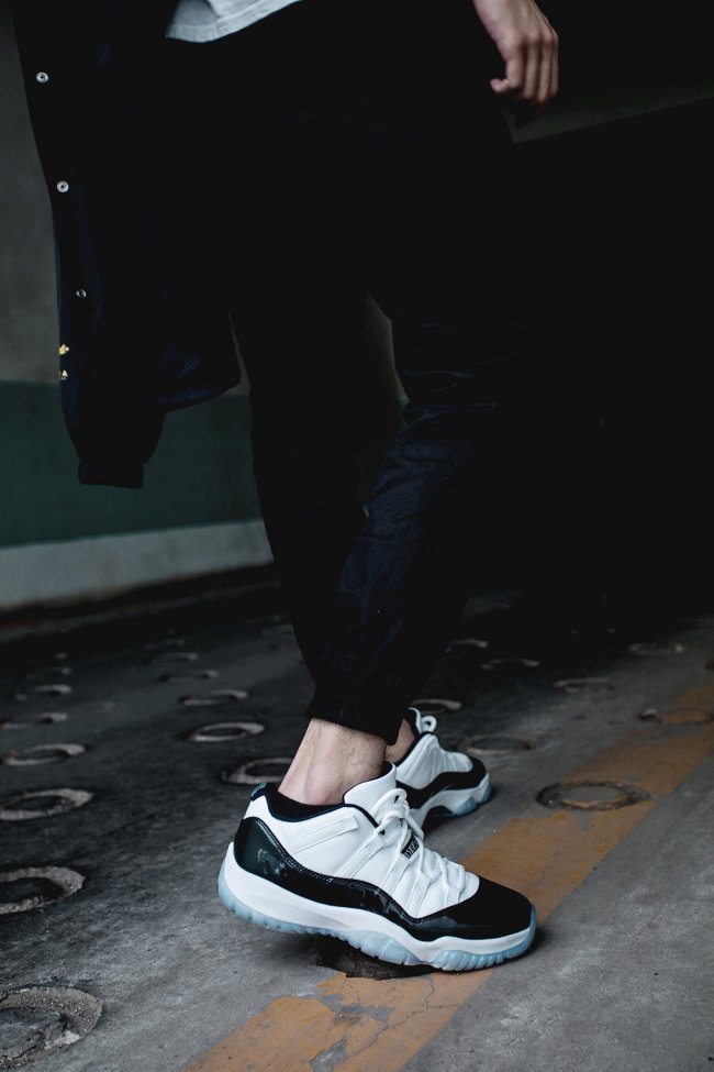 Air Jordan 11 Iridescent Sneakers in White and Black