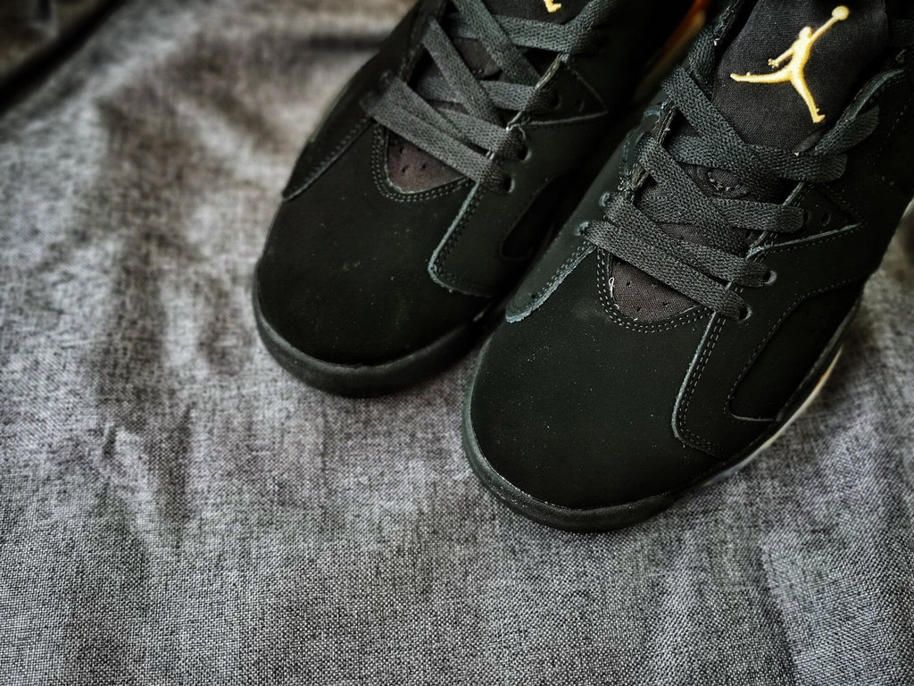 Air Jordan 6 Black and Gold High-Top Sneakers