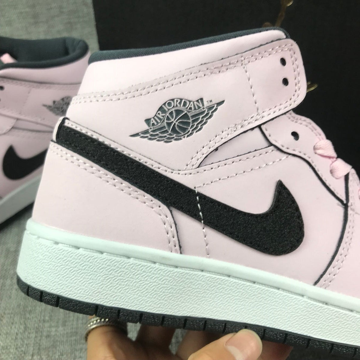 Air Jordan 1 Mid Pink and Black High-Top Sneakers