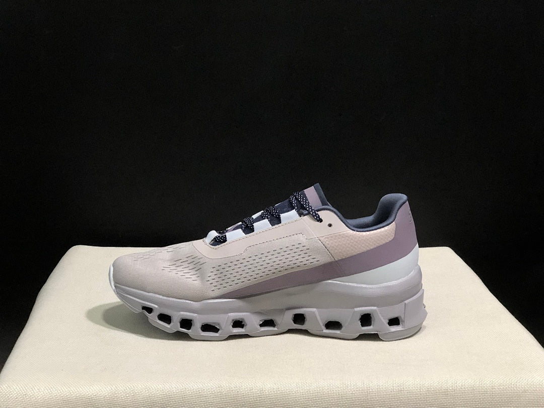 On Cloudmonster Sneakers in Gray and Purple