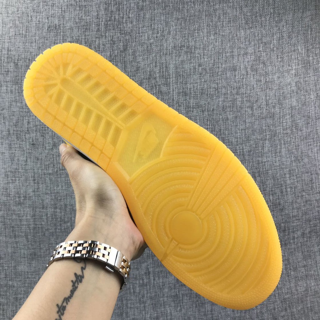 Air Jordan 1 Mid Black and Yellow Sneakers