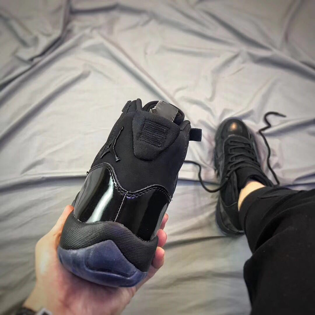 Air Jordan 11 Cap and Gown Black High-Top Sneakers
