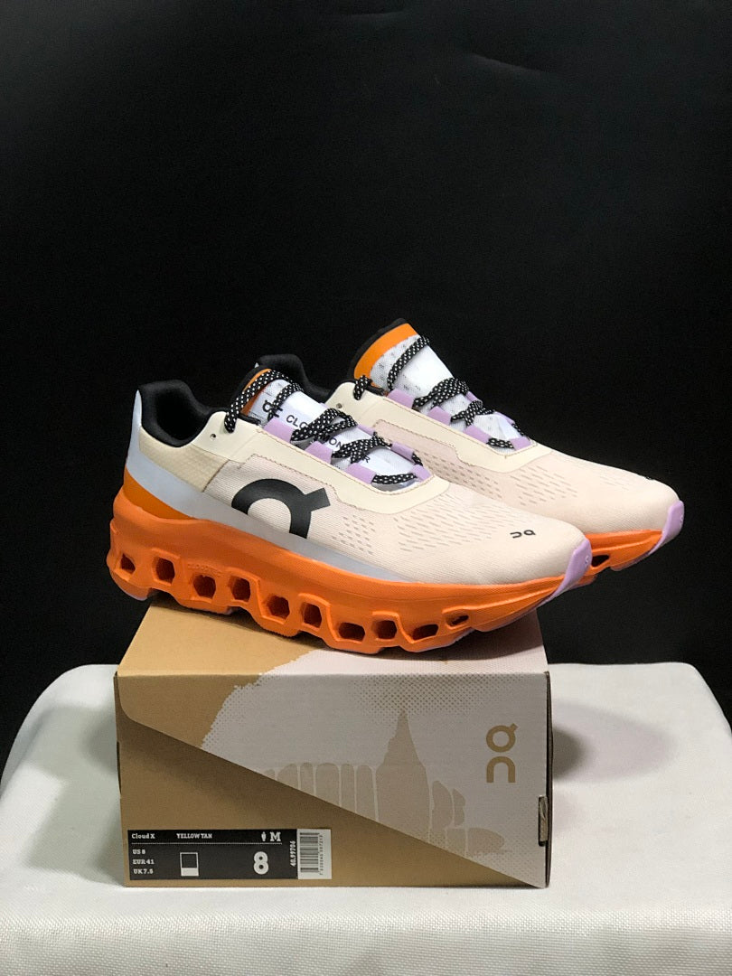 On Cloudmonster Running Shoes in Yellow Tan and Orange