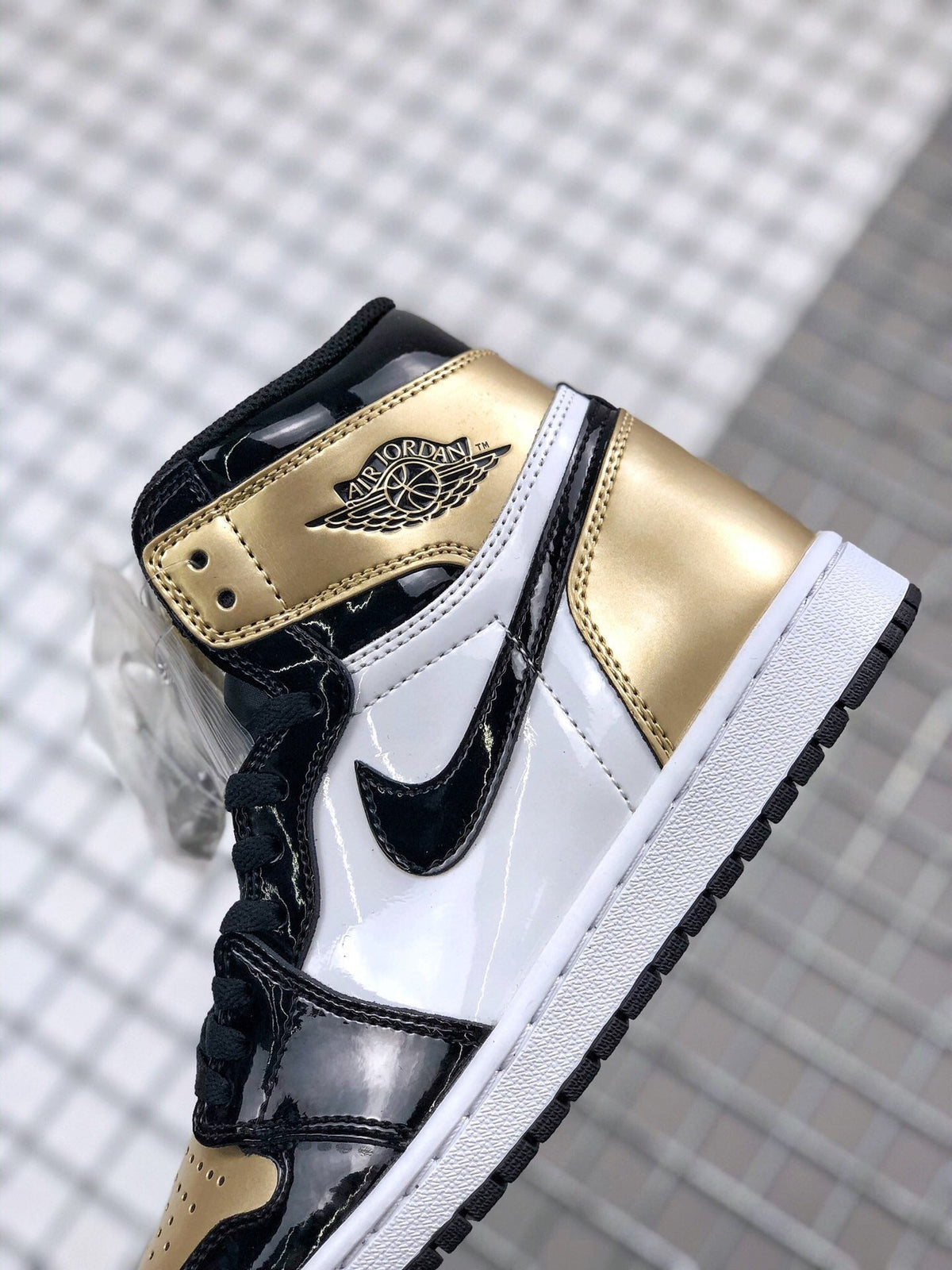 Air Jordan 1 High Gold Toe Black and Gold Sneakers