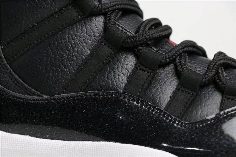 Air Jordan 11 Retro 72-10 Black and White High-Top Sneakers