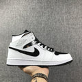 Air Jordan 1 Mid White and Black Sneakers