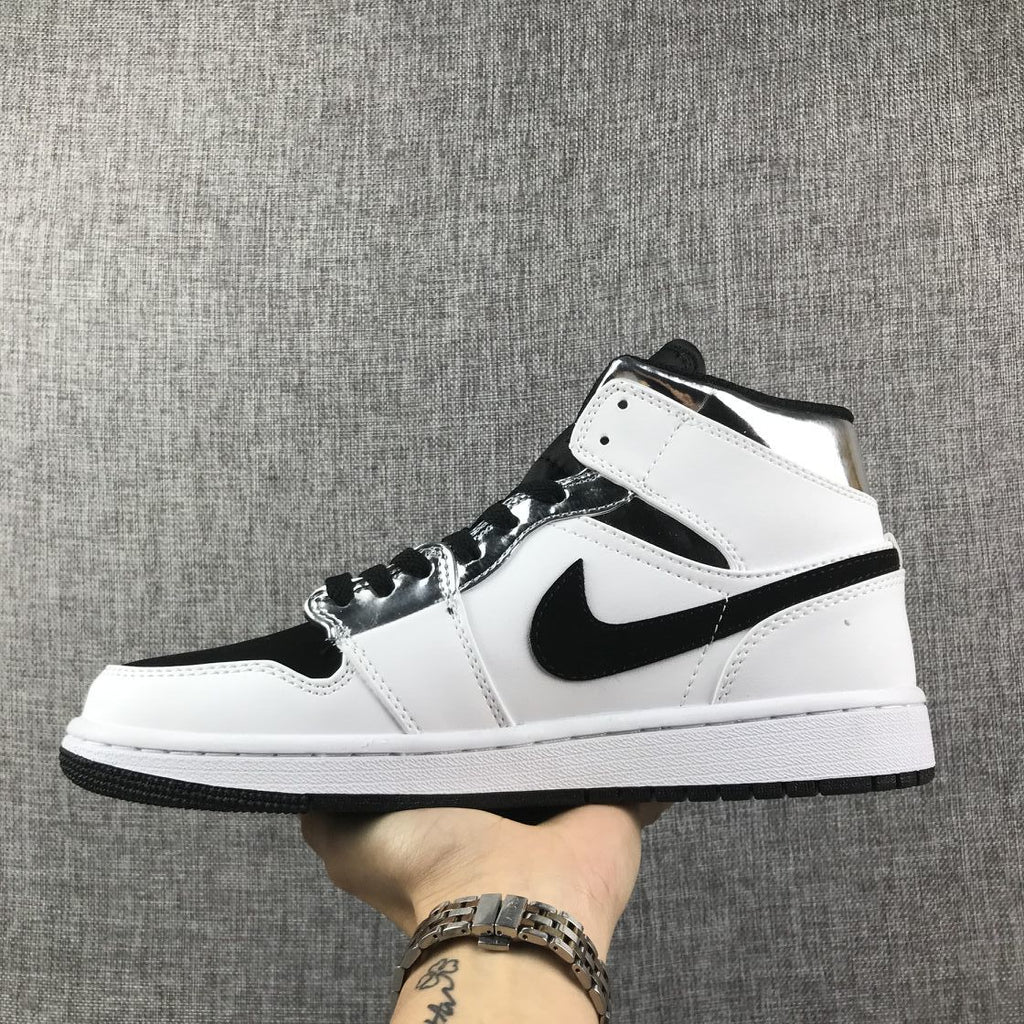 Air Jordan 1 Mid White and Black Sneakers