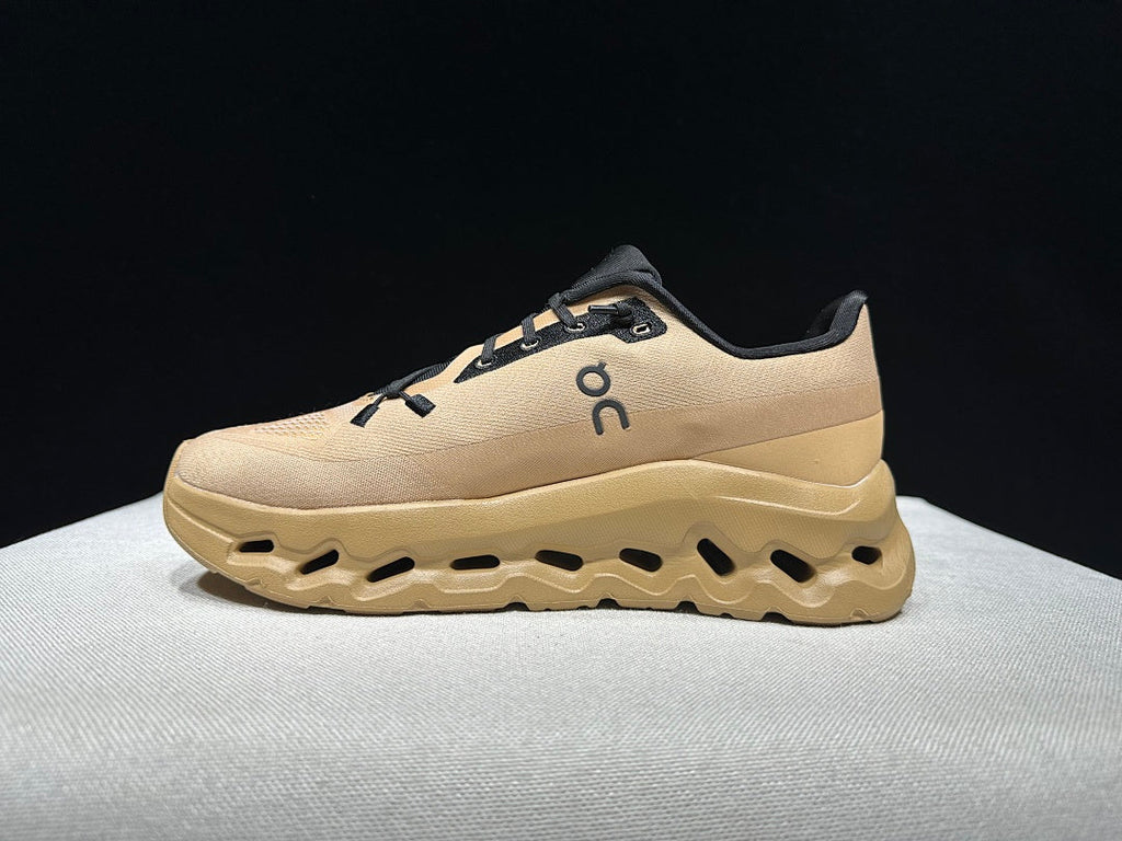 On Cloudtilt Sneakers in Brown and Black