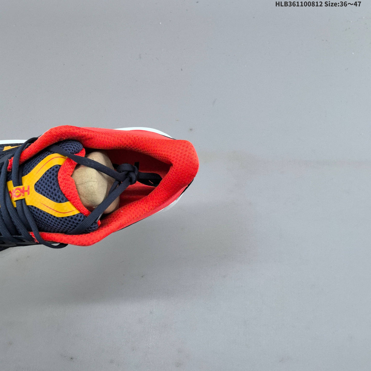 HOKA Bondi 9 Running Shoes in Navy, Red and Yellow