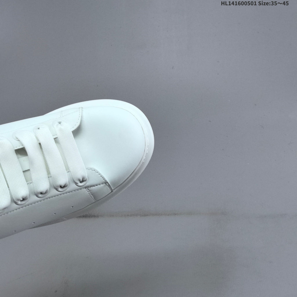 Alexander McQueen Oversized White Low-Top Sneakers with Black Heel