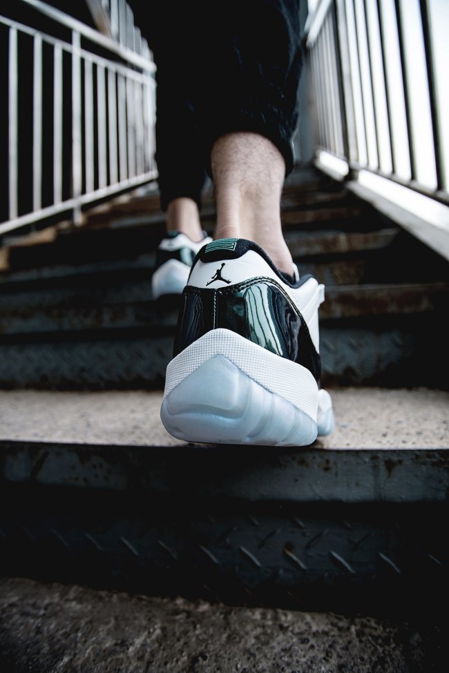 Air Jordan 11 Iridescent Sneakers in White and Black