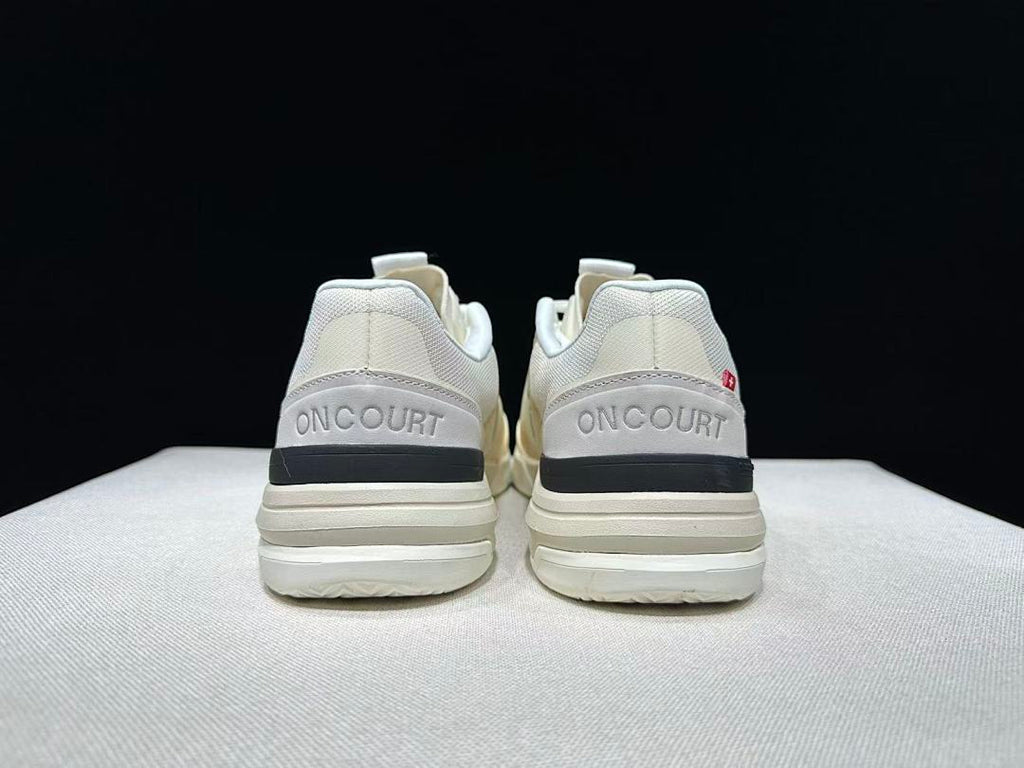 On The Roger Advantage Pro Sneakers in Cream and Black