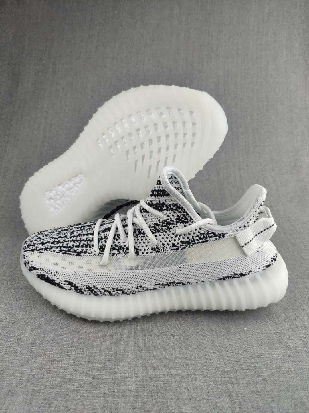 Yeezy 350 V2 Knit Sneakers in Black and White