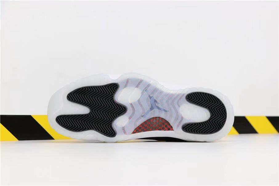 Air Jordan 11 Retro 72-10 Black and White High-Top Sneakers