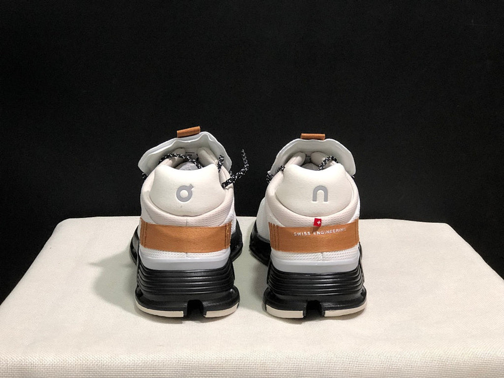 On Cloudnova Sneakers in White, Black and Tan