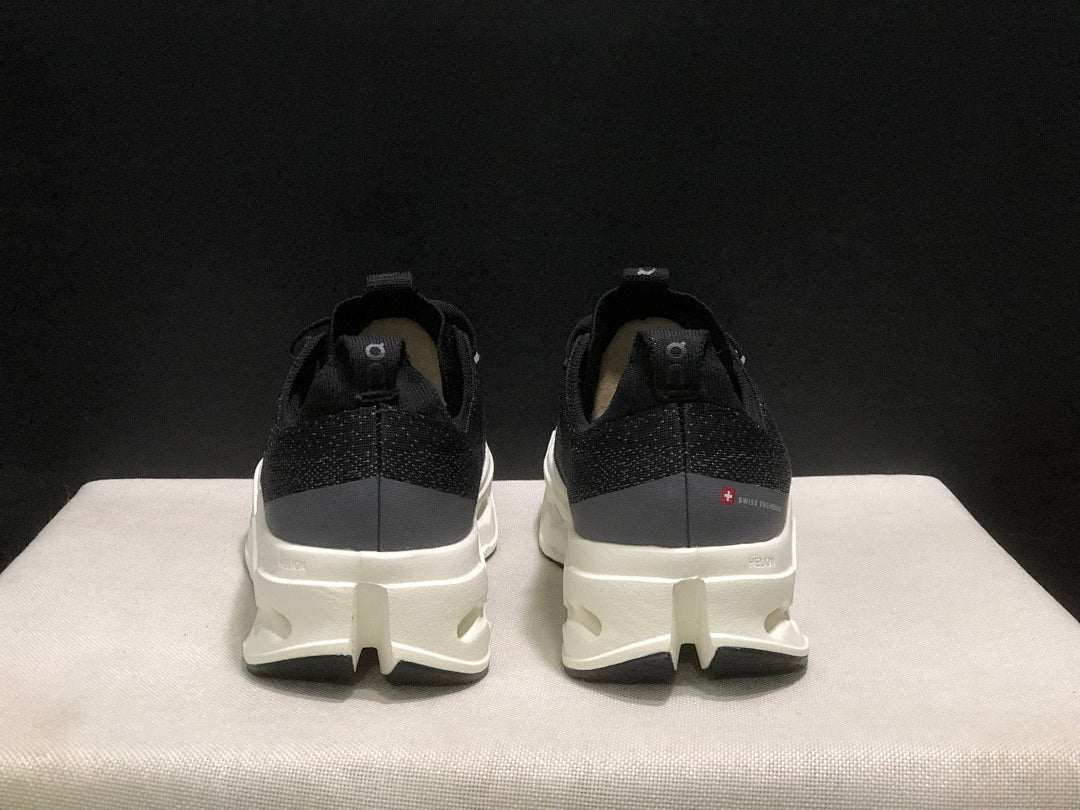 On Cloudsurfer Max Black and White Running Sneakers