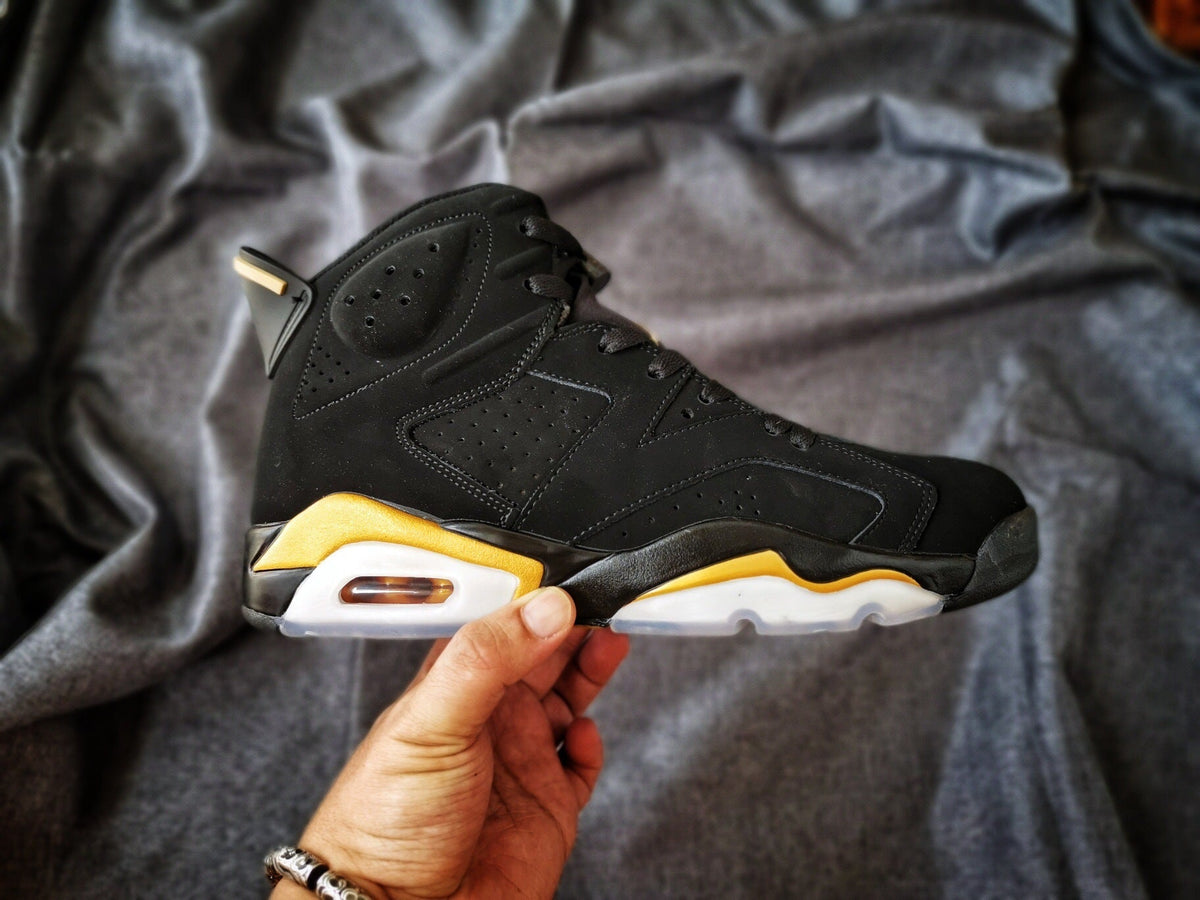 Air Jordan 6 Black and Gold High-Top Sneakers