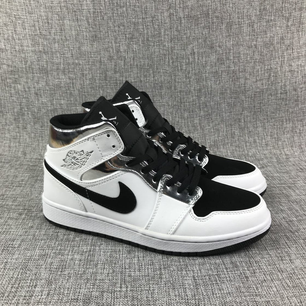 Air Jordan 1 Mid White and Black Sneakers