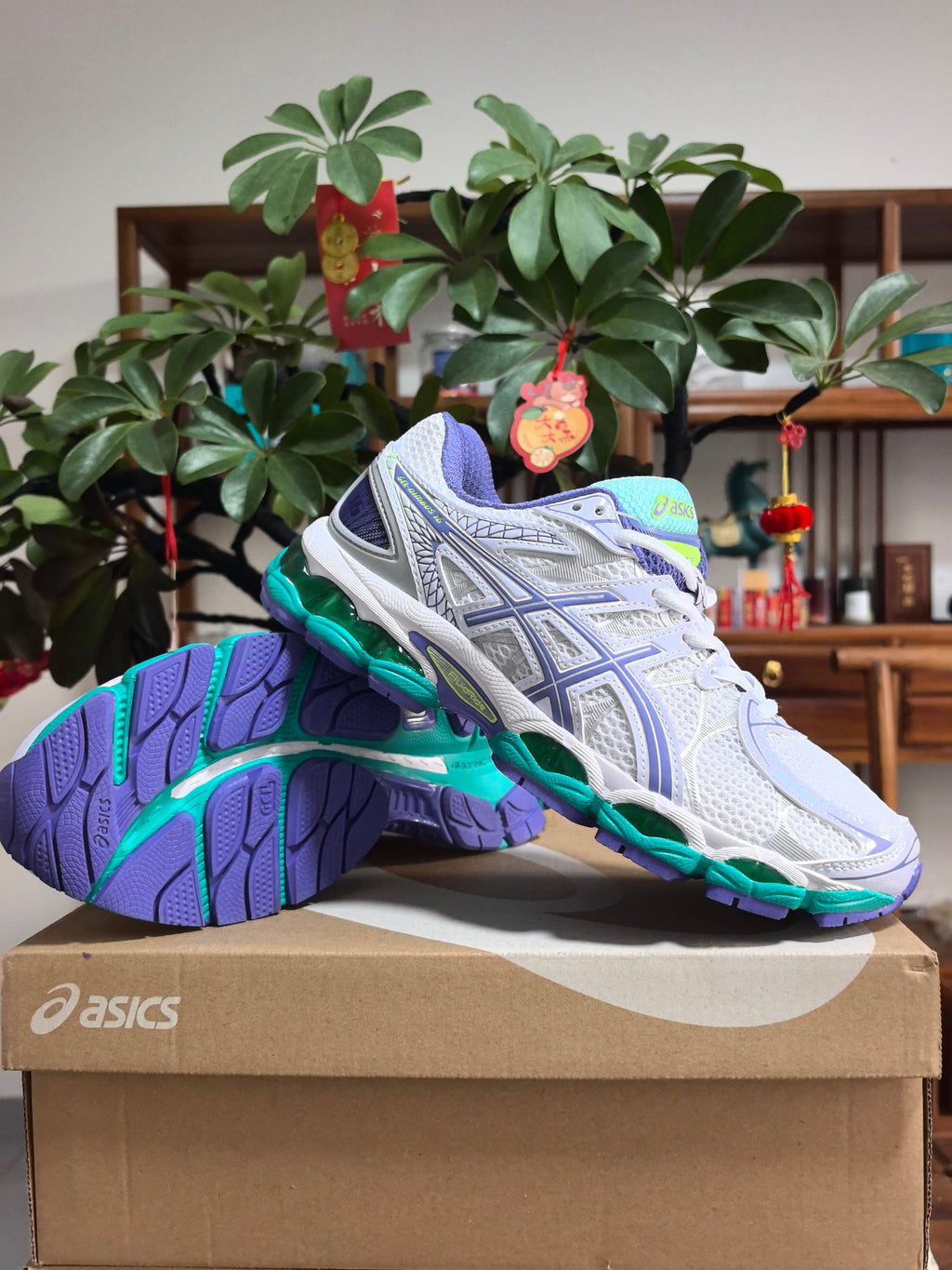 ASICS GEL-NIMBUS 16 Sneakers in Blue and Purple