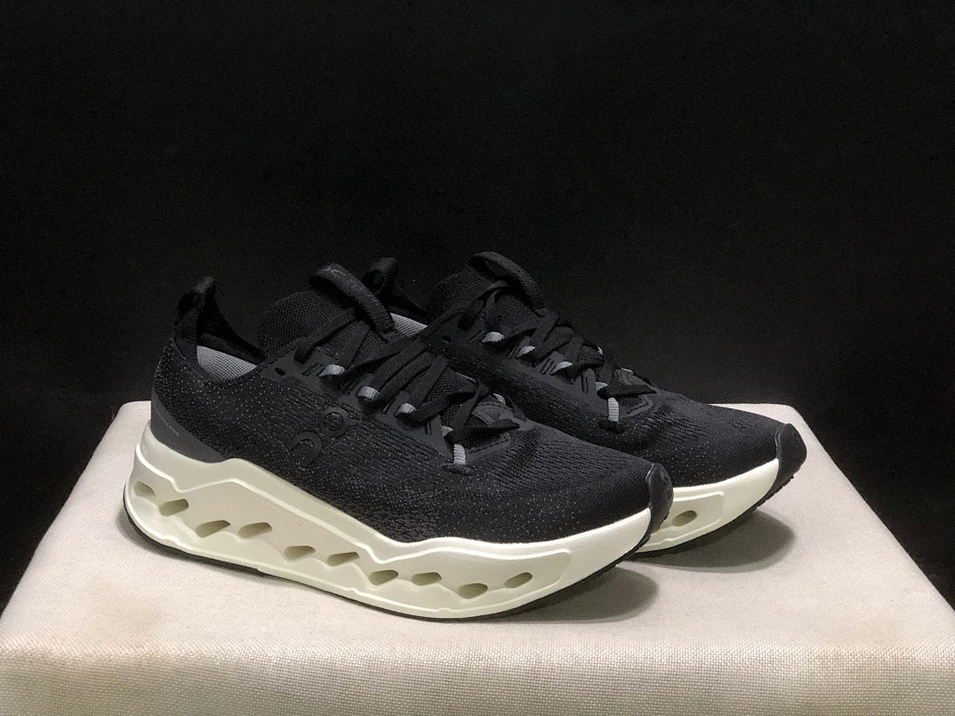 On Cloudsurfer Max Black and White Running Sneakers