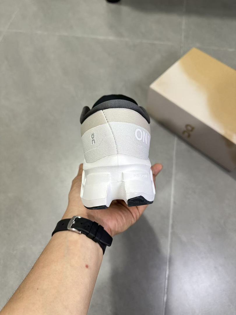 On Running Cloudmonster Sneakers in Gray and White