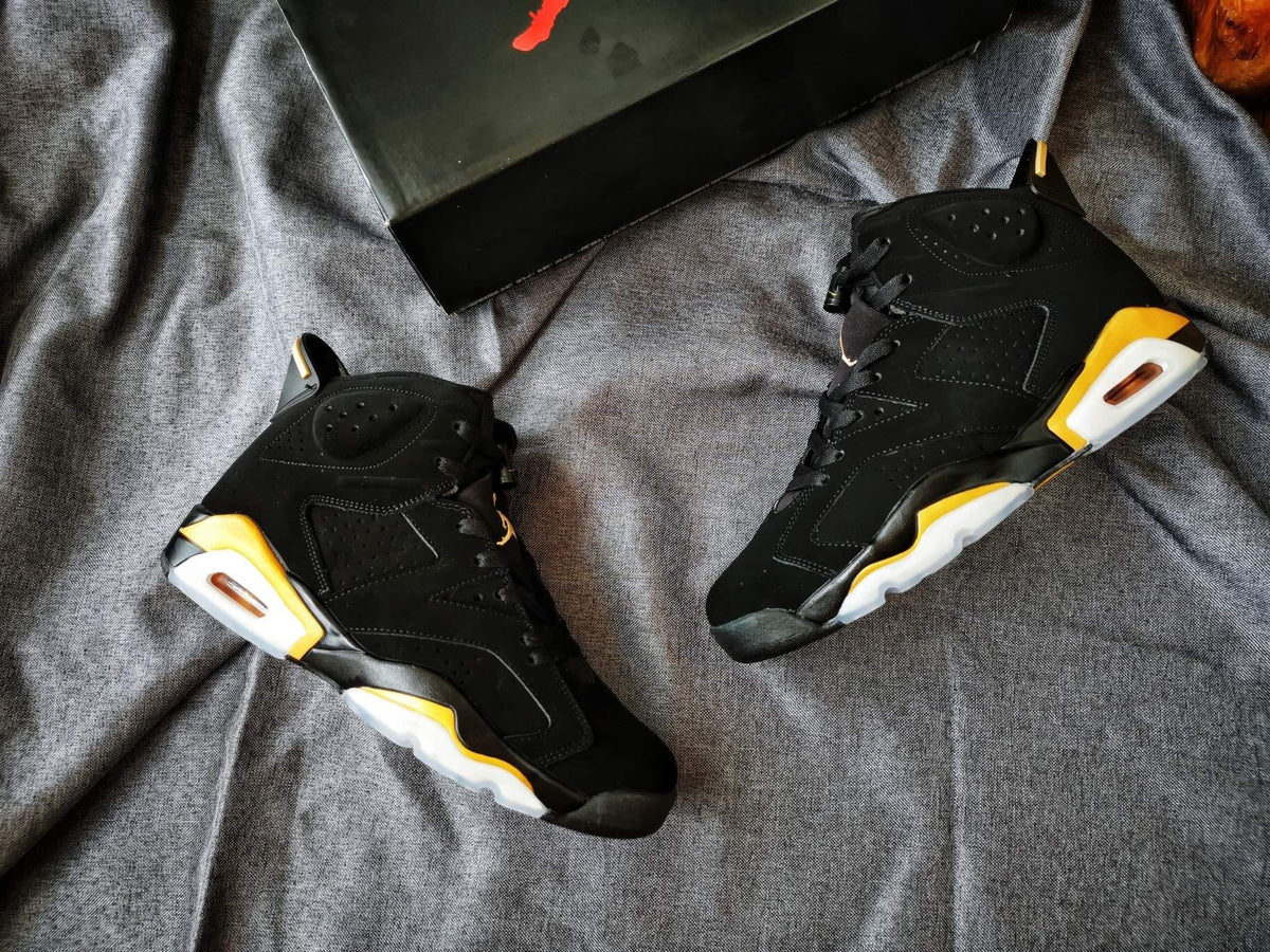 Air Jordan 6 Black and Gold High-Top Sneakers