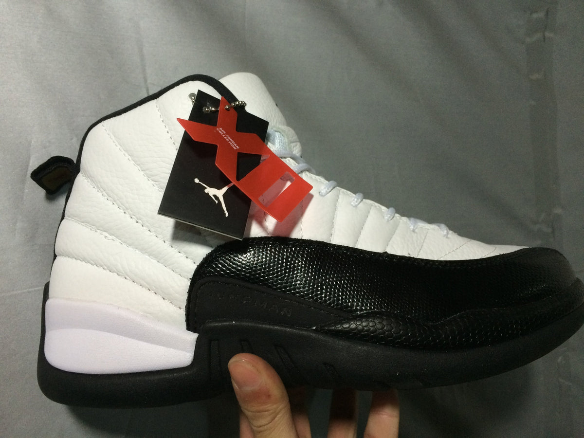 Jordan Air Jordan 12 Retro White and Black High-Top Sneakers