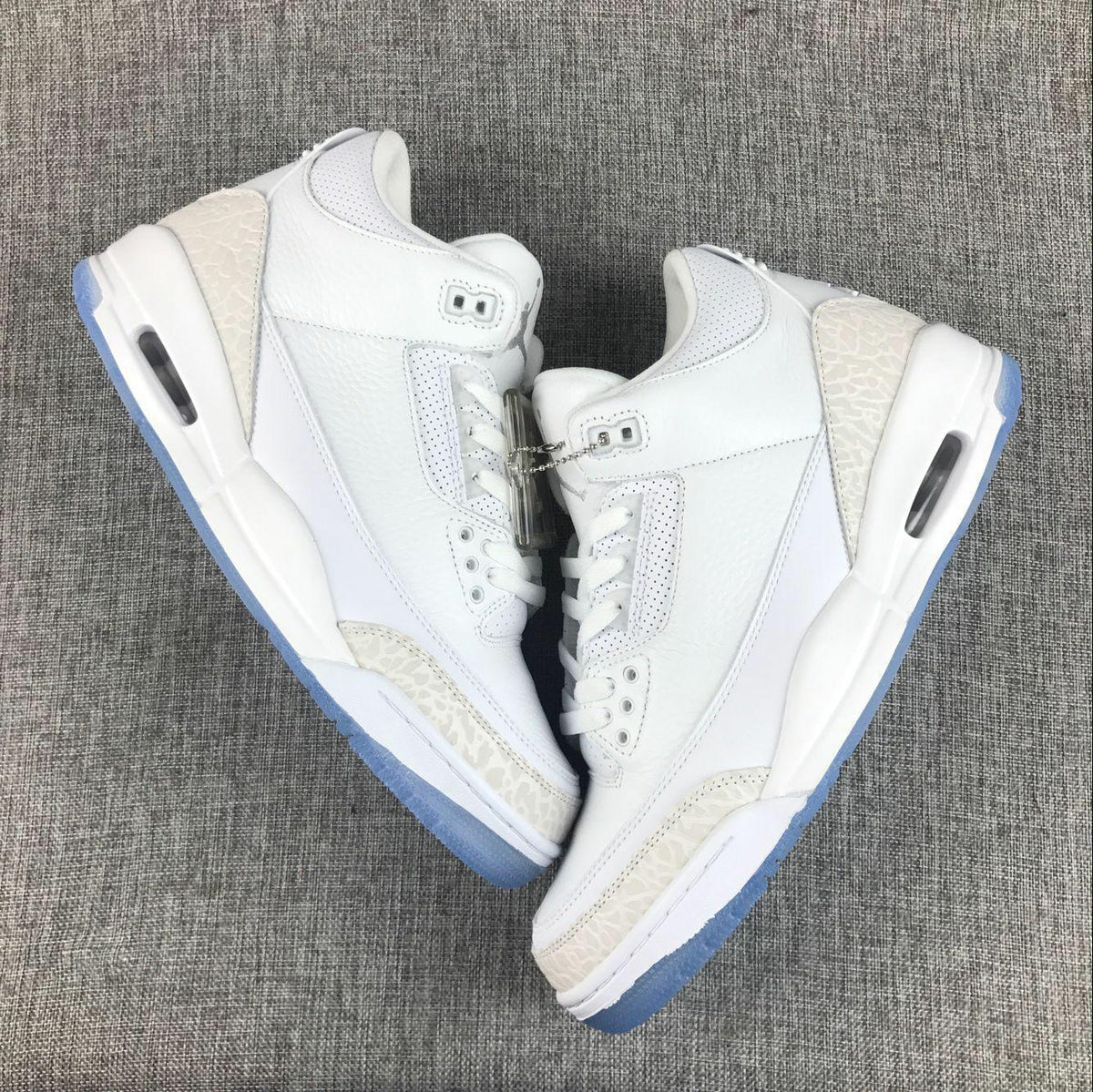 Jordan 3 White Cement Sneakers with Blue Translucent Sole