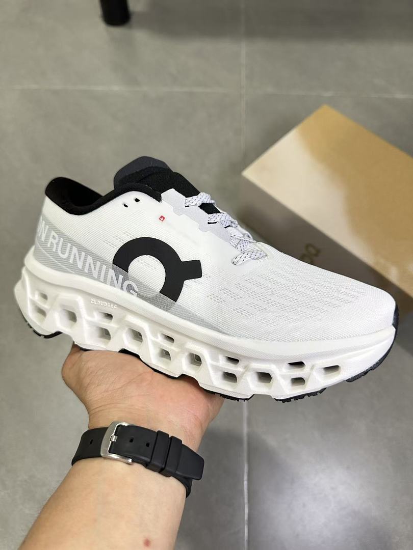 On Running White and Black Running Shoes