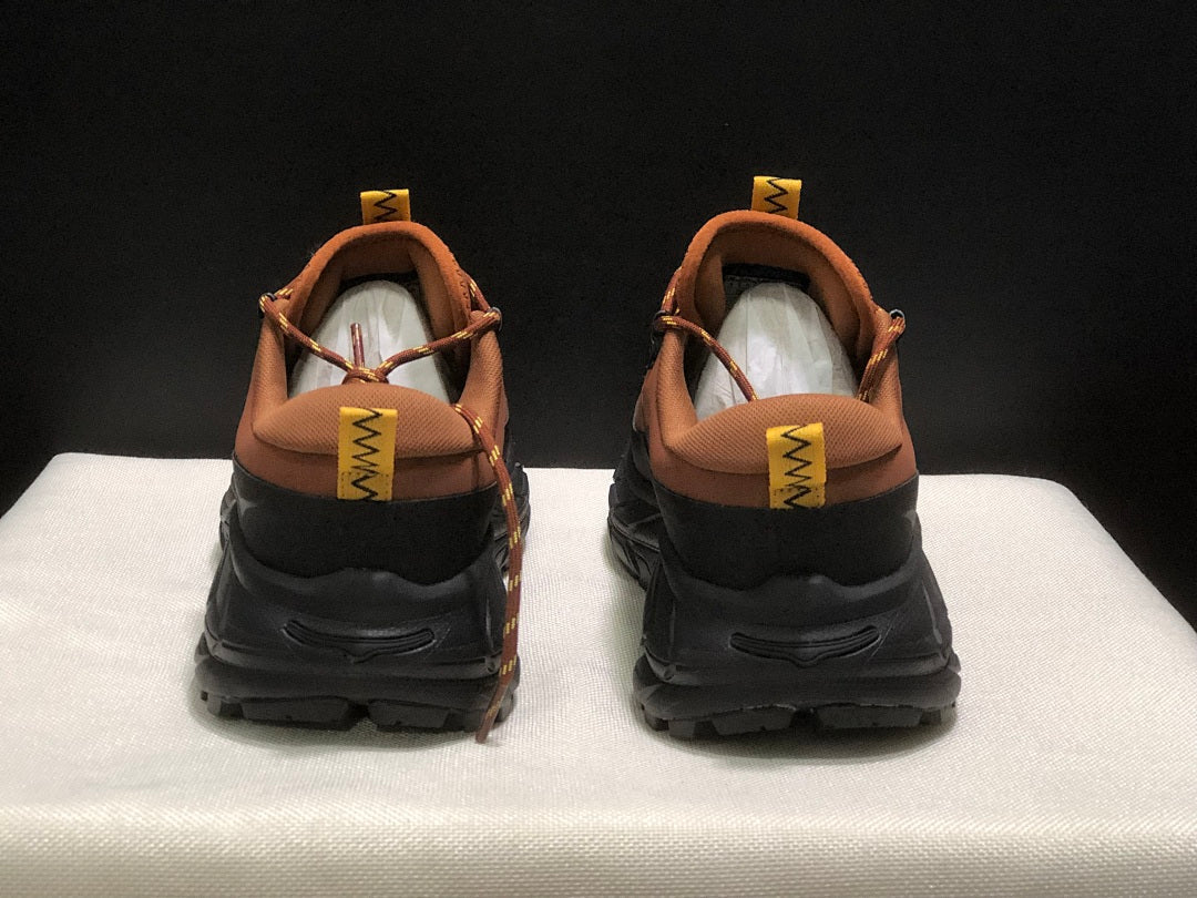 HOKA Tor Summit Hiking Shoes in Brown and Black